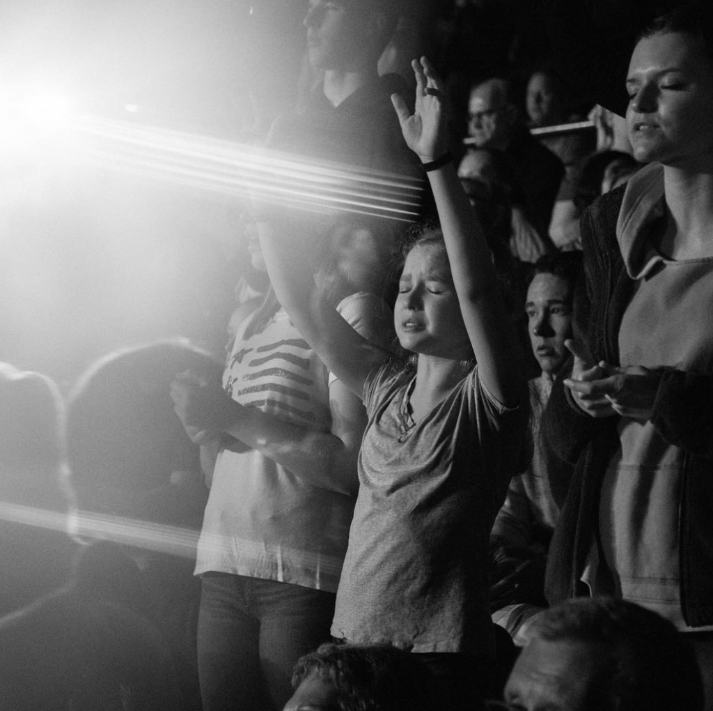 Kids praising our Lord during Chris Tomlin concert